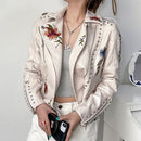 Geborduurd leren jasje met bloemenprint